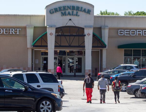 People make their way into the Greenbriar Mall in southwest Atlanta on Friday, May 1, 2020. STEVE SCHAEFER / SPECIAL TO THE AJC