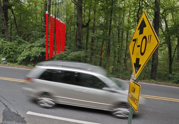 June 20, 2019 - Smyrna - Cobb County’s covered bridge gets a second warning device to stop drivers from running into the historic covered bridge on Concord Road. Bob Andres / bandres@ajc.com