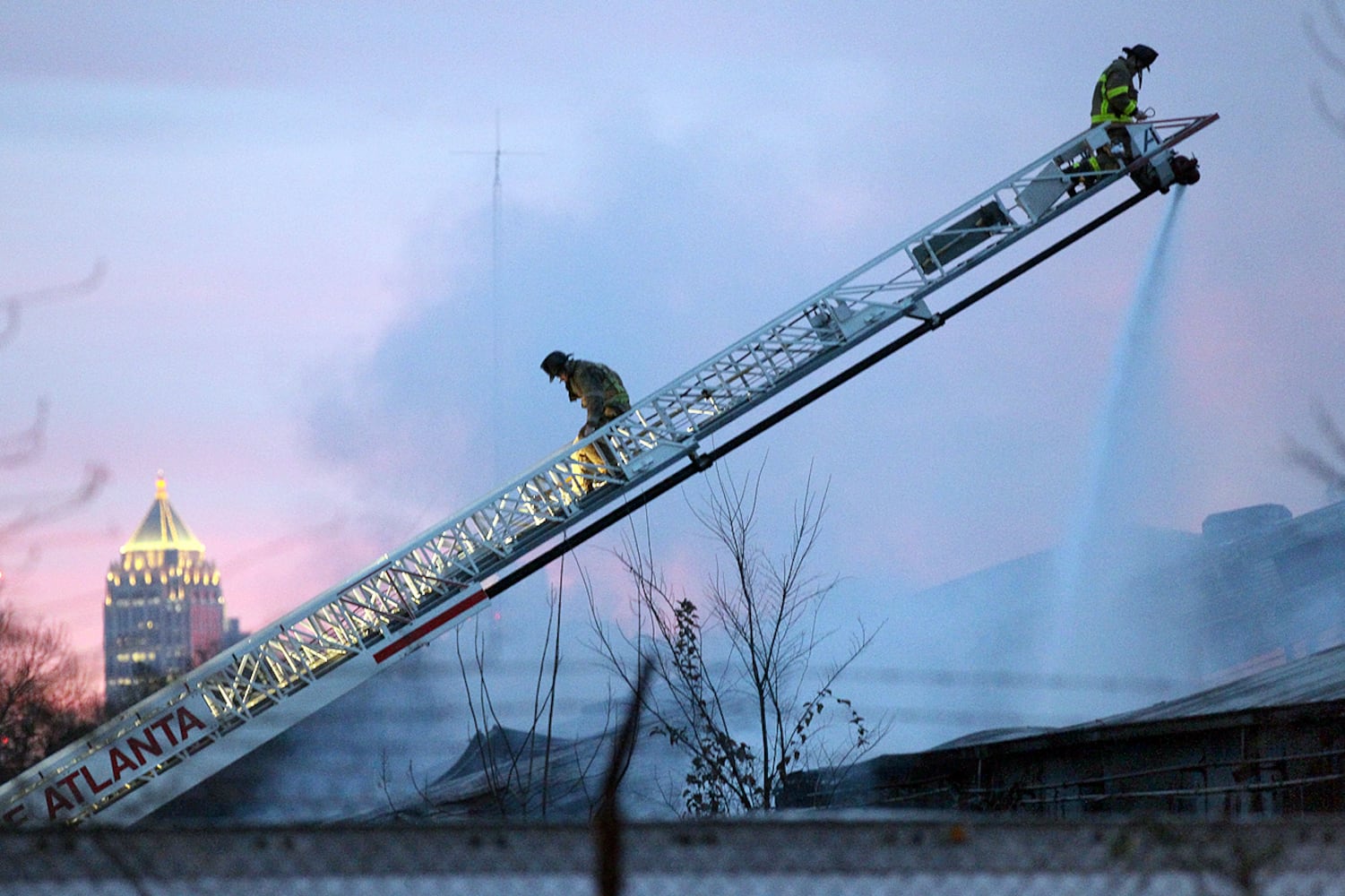 Atlanta firefighters battle warehouse fire