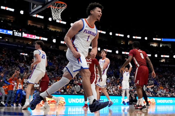 Florida guard Walter Clayton Jr. (1) reacts to a basket against Alabama during the second half of an NCAA college basketball game in the semifinal round of the Southeastern Conference tournament, Saturday, March 15, 2025, in Nashville, Tenn. (AP Photo/George Walker IV)