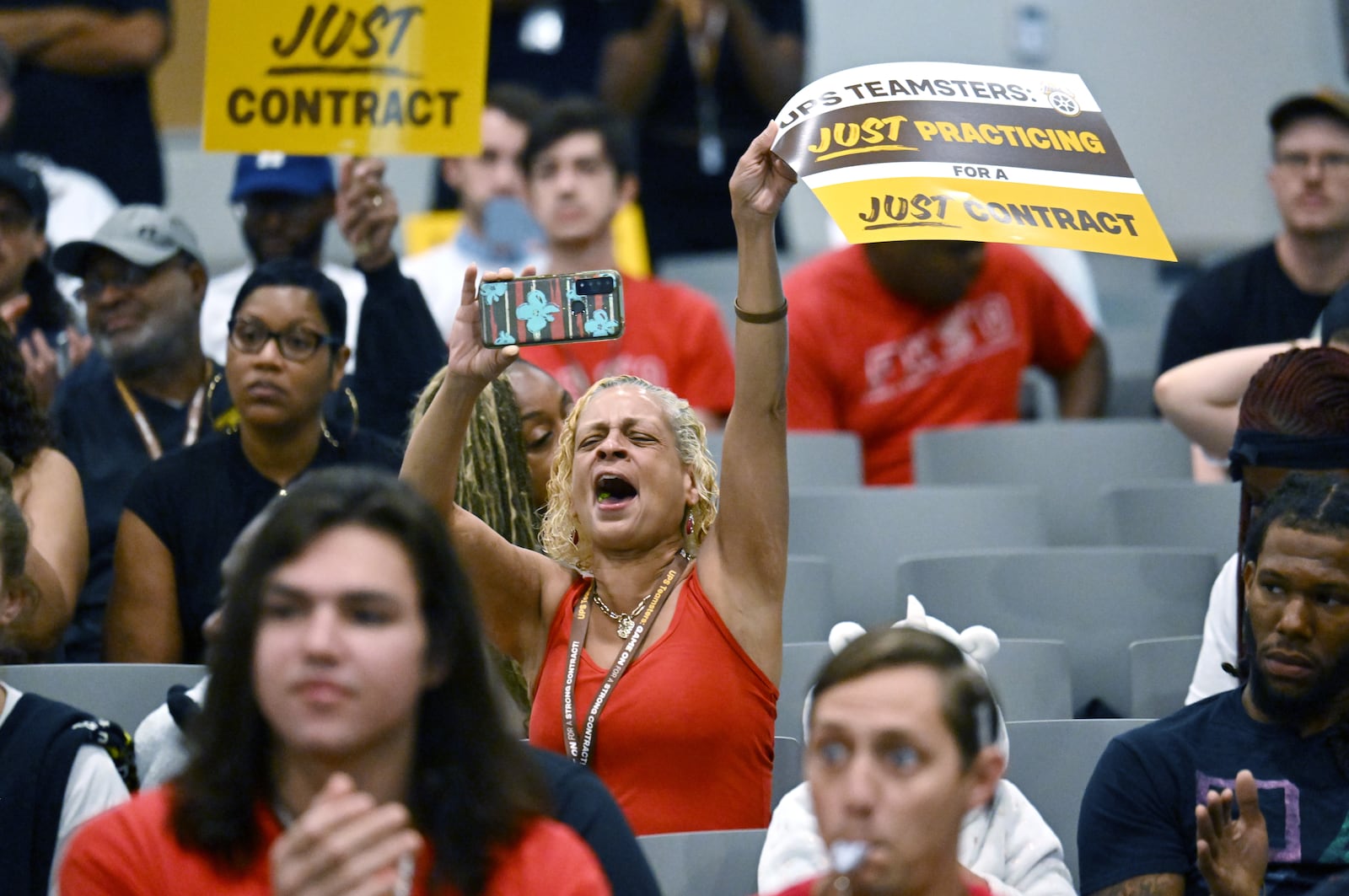 Teamsters members cheer during a rally just days before high-stakes contract talks with UPS are set to resume, at Teamsters Local 728, Saturday, July 22, 2023, in Atlanta. The head of the International Brotherhood of Teamsters revved up the union’s membership in Atlanta on Saturday at a rally just days before high-stakes contract talks with UPS are set to resume. (Hyosub Shin / Hyosub.Shin@ajc.com)