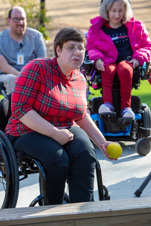 Sarah Grace throws the ball during game of bocce with Brenau Occupational Therapy students at Champions Place. PHIL SKINNER FOR THE ATLANTA JOURNAL-CONSTITUTION.