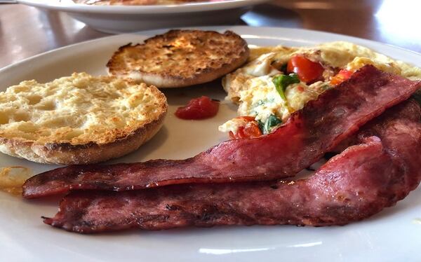 The Lightspeed Slam features egg whites, hard melon, wizened strips of turkey bacon and barely toasted English muffins. (Chris Borrelli/Chicago Tribune/TNS)