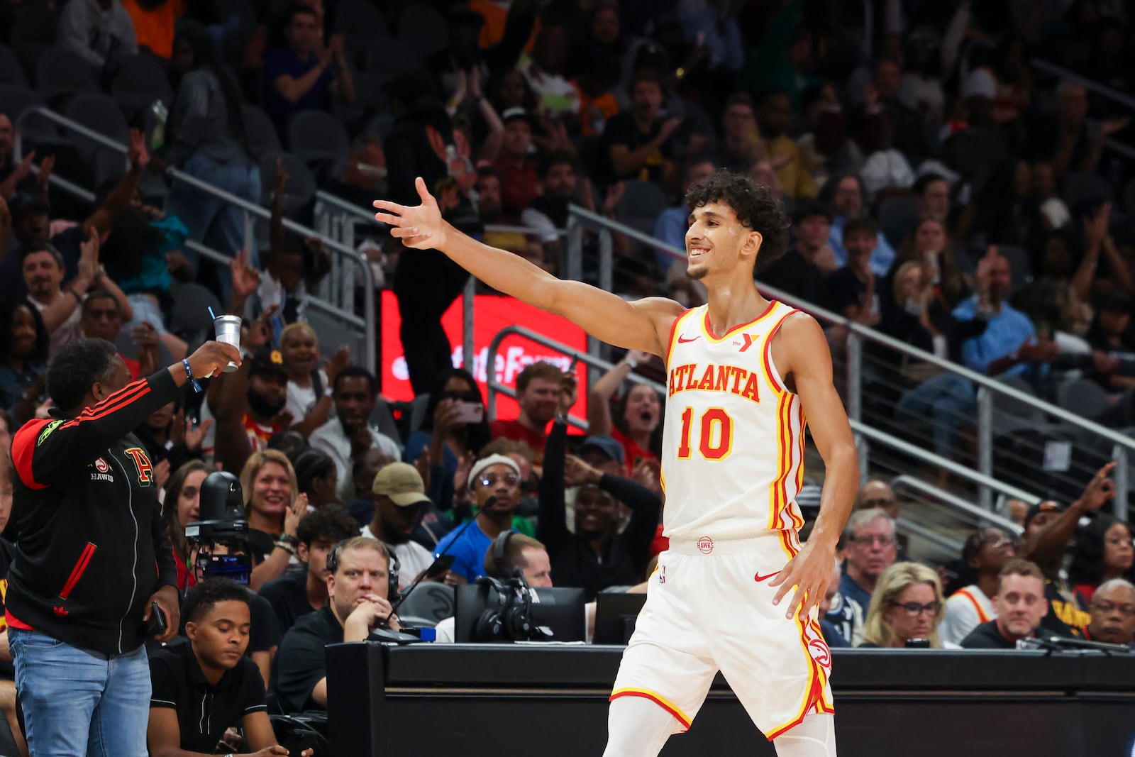 Hawks rookie Zaccharie Risacher reacts after making a three-pointer during an exhibition game against the Pacers.
