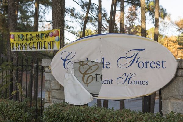 The sign for Creekside Forest Apartment Homes complex in Decatur as it appeared in November 2016. (DAVID BARNES / DAVID.BARNES@AJC.COM)