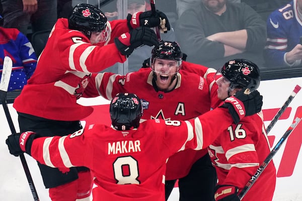 The Canadians celebrates after the game-winning goal against the United States on Thursday. 