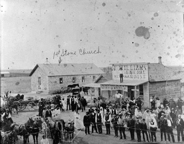 A community portrait from circa 1885 of Washington Street in Nicodemus, KS. (Library of Congress)