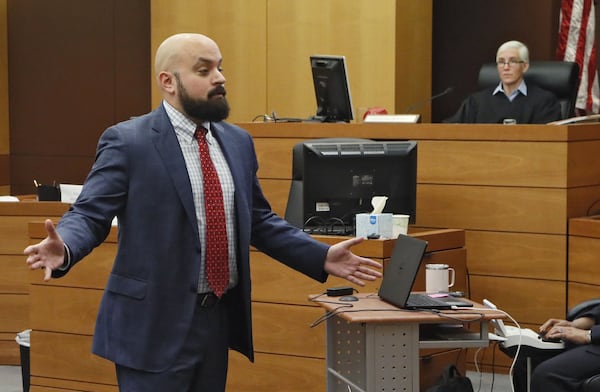 Defense attorney Scott Grubman makes his opening statement in the court of Judge Jane Morrison (right). The trial began Tuesday in the first-ever criminal prosecution of an alleged violation of the Georgia Open Records Act. Jenna Garland, a former press secretary to ex-Atlanta Mayor Kasim Reed, is accused of ordering a subordinate to delay the release of water billing records requested by Channel 2 Action News that were politically damaging to Reed and other city elected officials. BOB ANDRES / BANDRES@AJC.COM