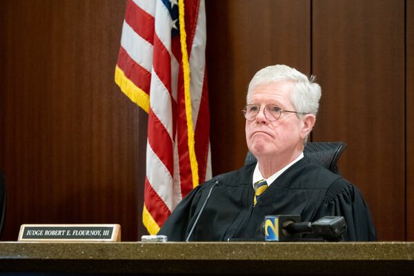 Judge Robert Flournoy III presides over the arraignment of Bryan Rhoden in Cobb Superior Court on Monday during his arraignment. Rhoden is facing the death penalty in the shooting deaths of three people at a Kennessaw-area country club last year. (Ben Gray for the Atlanta Journal-Constitution)