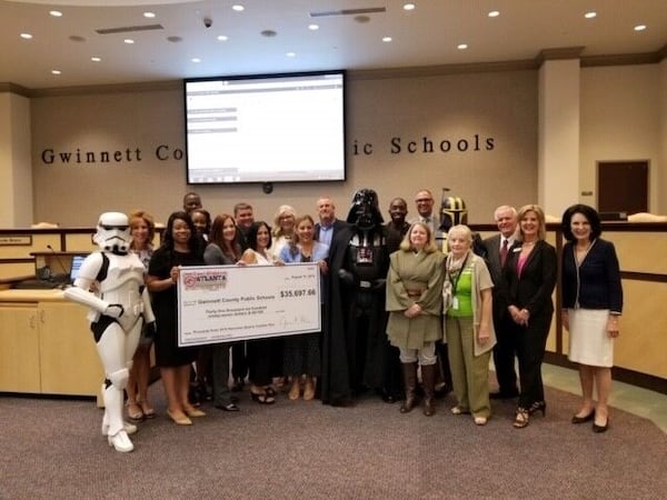 Vulcan Materials donated the proceeds from its annual Atlanta Quarry Crusher Run held in May at Vulcan's Norcross Quarry to four organizations including three Gwinnett County Public schools. The organization presented a check at the Board of Education meeting in August. COURTESY OF VULCAN MATERIALS