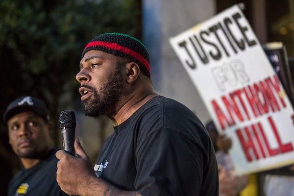 10/14/2019 -- Decatur, Georgia -- Norman "Dre Love" Propst (center), of Alliance for Black Lives, speaks in support of a long jail sentence for former DeKalb County Police Officer Robert "Chip" Olsen after he was found not guilty for the murder of Anthony Hill at the DeKalb County Courthouse, Monday, October 14, 2019.  The jurors reached guilty verdicts on four lesser charges: two counts of violation of oath of office, aggravated assault and making a false statement. (Alyssa Pointer/Atlanta Journal Constitution)