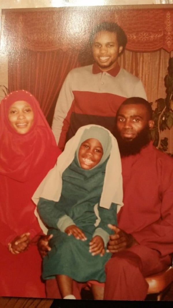 Joy Fluker (center) is shown as a young girl with her mother Anna Elizabeth Young and other family members. Photo provided by Joy Fluker.