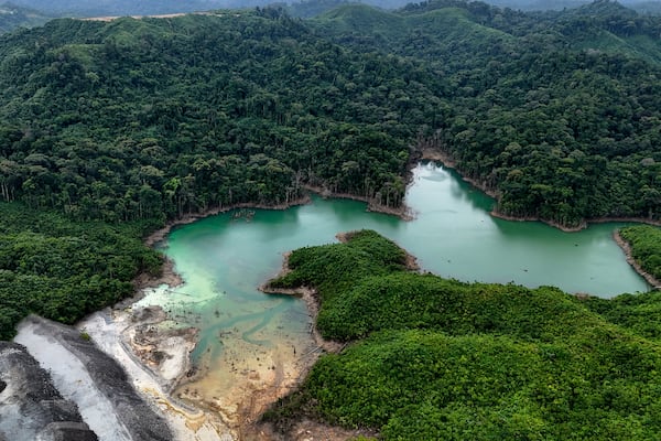 A tailing pond sits in the Cobre Panamá copper mine, owned by Canada's First Quantum Minerals, during a media tour of the mine that was closed after Panama's Supreme Court ruled that the government concession was unconstitutional, in Donoso, Panama, Friday, March 21, 2025. (AP Photo/Matias Delacroix)