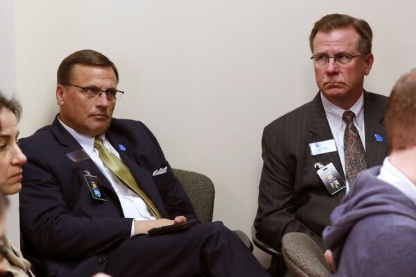 Mike Griffin (left) and Tom Rush, lobbyists for the Georgia Baptist Mission Board, are regulars among the lobbying corps during the General Assembly’s annual legislative session. BOB ANDRES / BANDRES@AJC.COM