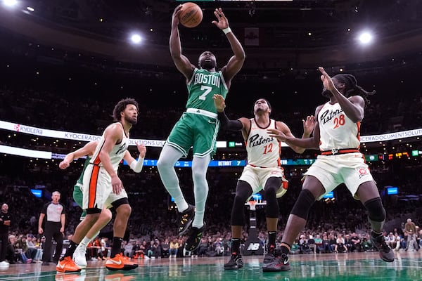 Boston Celtics guard Jaylen Brown (7) drives to the basket against the Detroit Pistons during the first half of an NBA basketball game, Wednesday, Dec. 4, 2024, in Boston. (AP Photo/Charles Krupa)