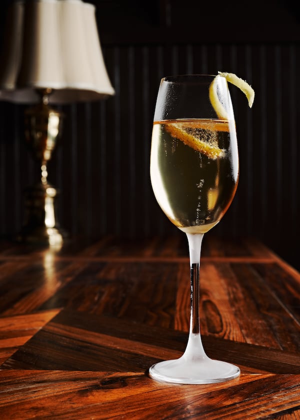 It looks like a delicate glass of Champagne, but Kimball House's French 75 packs an elegant punch with cognac and lemon. (Courtesy of Andrew Thomas Lee)