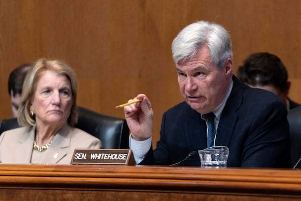 Sen. Sheldon Whitehouse D-R.I., ranking member of the Senate Environment and Public Works Committee, speaks during the nominations of David Fotouhi nominated to be Deputy Administrator of the Environmental Protection Agency (EPA) and Aaron Szabo nominated to be Assistant Administrator for the Office of Air and Radiation of the EPA, during a hearing on Capitol Hill Wednesday, March 5, 2025, in Washington, as Sen. Shelley Moore Capito, R-W.Va., Chairman of the Senate Environment and Public Works Committee, listens. (AP Photo/Jose Luis Magana)