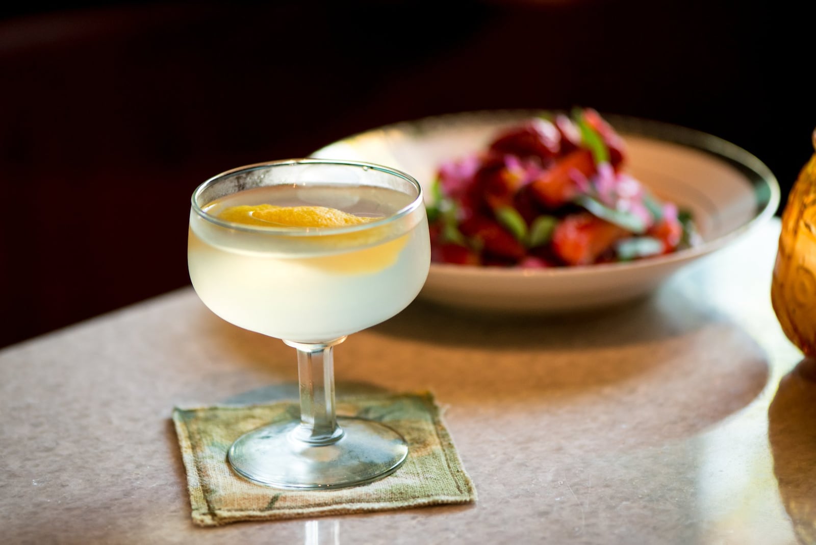 The signature Cardinal cocktail combines gin, dry vermouth, muscadine wine, and honey. CONTRIBUTED BY MIA YAKEL