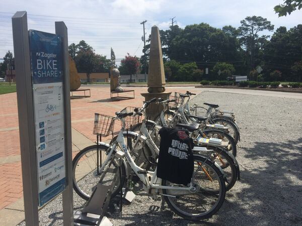 A bike share station at Town Center Park, one of two locations where people can pick up and drop off rented bikes in Suwanee. By joining the bike share program, the first three hours to ride are free, a boon in a city that continues to build a bigger and more connecting network of parks and trails. JILL VEJNOSKA / JVEJNOSKA@AJC.COM