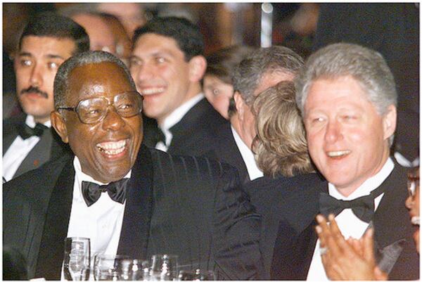 Then-president Bill Clinton was among the guests at Aaron's 65th birthday gala at the Hyatt Regency in Atlanta in 1999.