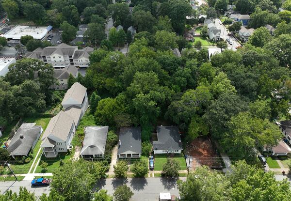 September 8, 2022 Atlanta - An aerial view of older homes (left) and new residential housing in the Reynoldstown neighborhood are shown from above on Thursday, September 8, 2022. Greg Levine, Trees Atlanta’s co-executive director, says zoning rules in some neighborhoods often allow developers to build to the edge of the property line, leaving no room for trees to be replanted. (Hyosub Shin / Hyosub.Shin@ajc.com)