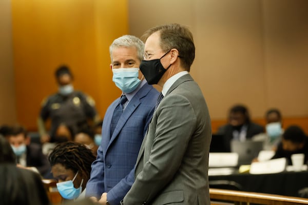 Young Thug lawyer Brian Steel speaks with Tom Clyde, attorney for AJC, WSB, CNN, and Associated Press, as they wait for the Fulton County Superior Court Chief Judge Ural Glanville Judge during the Jury selection portion of the trial at Fulton County courtroom on Monday, Feb 13, 2023.  Miguel Martinez / miguel.martinezjimenez@ajc.com