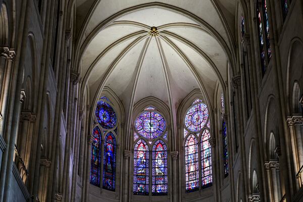 Windows in the heart of Notre-Dame de Paris cathedral are seen while French President Emmanuel Macron visits the restored interiors of the monument, Friday Nov. 29, 2024, in Paris. (Stephane de Sakutin, Pool via AP)