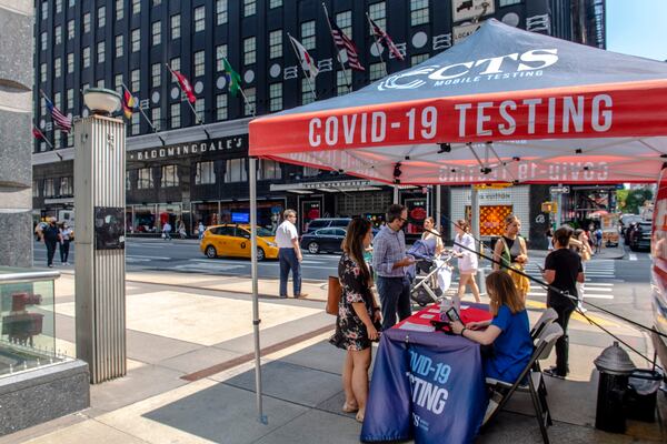 A COVID-19 testing site in New York, July 28. With a new variant of the coronavirus rapidly spreading across the globe, masks are again the focus of conflicting views, and fears, about the course of pandemic and the restrictions required to manage it. (Brittainy Newman/The New York Times)