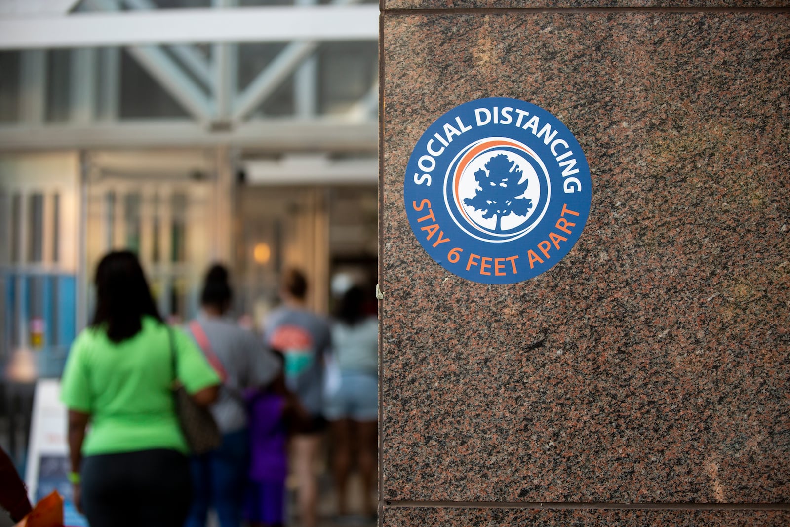 The Fulton County Government Center was sporadically bustling in downtown Atlanta, Georgia, on Monday, June 29, 2020. All visitors and employees entering the Fulton County Government Center were told to wear a mask, practice social distancing, and they had their temperature checked before entering the building in an attempt to decrease the spread of COVID-19. (REBECCA WRIGHT FOR THE ATLANTA JOURNAL-CONSTITUTION)