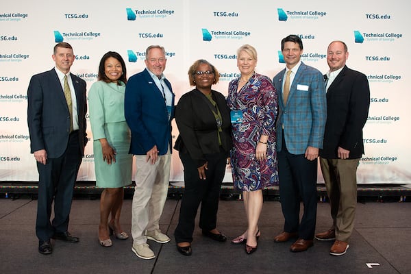 The Technical College System of Georgia handed out adult education honors this week. Pictured (from left) are TCSG Commissioner Greg Dozier, Assistant Commissioner for Adult Education Cayanna Good, TCSG board member Mike Long, award recipient Patria Brown, award recipient Rhea Brashear, and TCSG board members Daren Wayne and John Thomas. (Courtesy of Technical College System of Georgia)