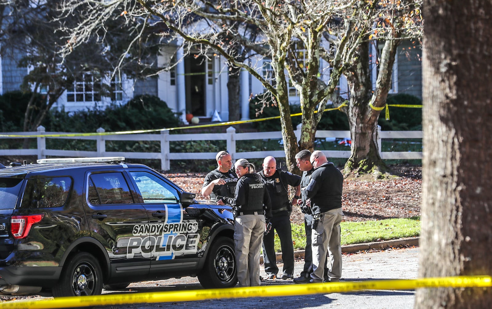 A man was shot in the living room of a home on Cameron Glen Drive after attacking a Sandy Springs police officer with a knife, according to authorities.