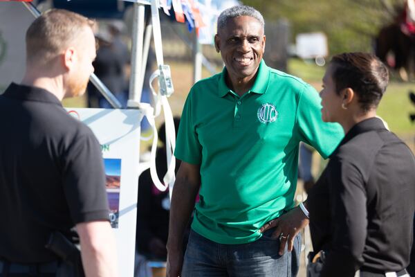 Ray Thomas talks with people during the second Taste Of  Mableton Festival Saturday, April 15, 2023.  (Steve Schaefer/steve.schaefer@ajc.com)