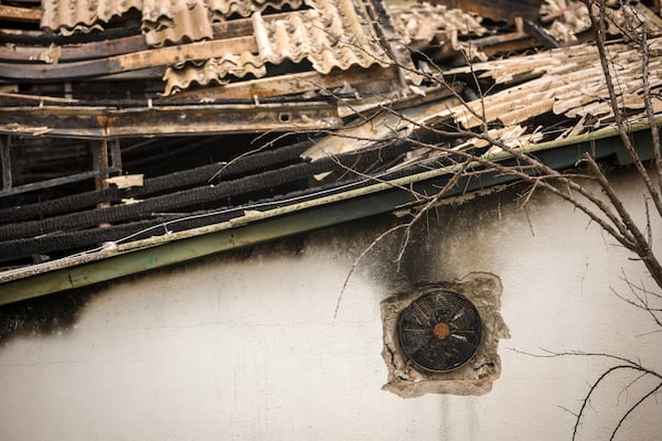 A charred ventilator on the wall of a nightclub building, damaged following a massive fire early Sunday in the town of Kocani, North Macedonia, Monday, March 17, 2025, (AP Photo/Armin Durgut)