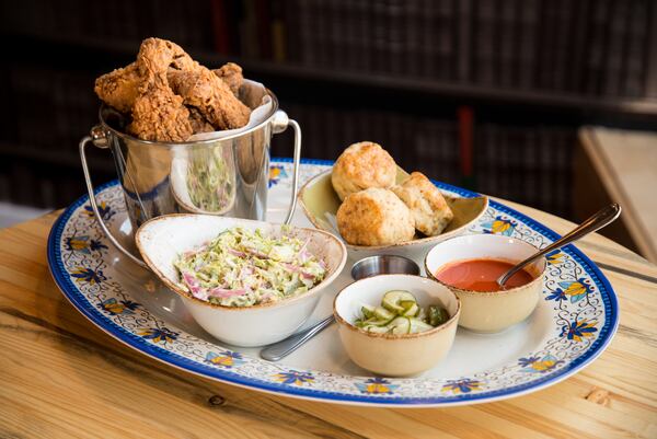  Punch Bowl Social Big Baller Platter A Colonel of Truth, 12 piece bucket of OMFG GF Fried Chicken, bread and butter pickles, house-made slaw, buttermilk biscuits and hot sauce butter. Photo credit- Mia Yakel.