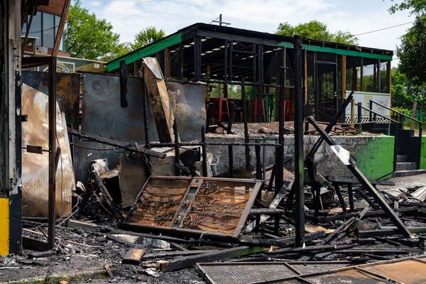 The building almost completely destroyed after an 11:30 a.m. fire. 