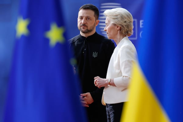 European Commission President Ursula von der Leyen, right, speaks with Ukraine's President Volodymyr Zelenskyy as they arrive for an EU Summit at the European Council building in Brussels, Thursday, March 6, 2025. (AP Photo/Omar Havana)