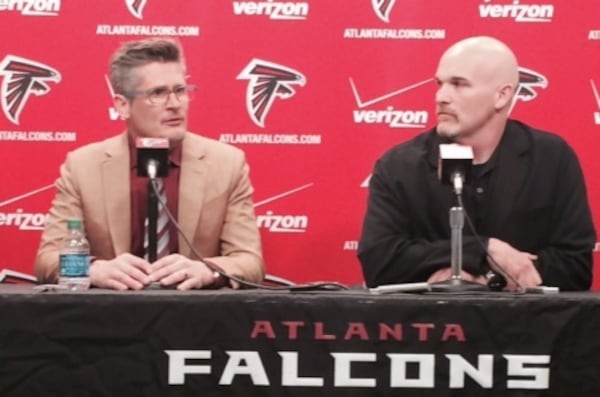 Falcons general manager Thomas Dimitroff and head coach Dan Quinn discussing the upcoming NFL draft on Thursday, April 24, 2015. (D. Orlando Ledbetter/DLedbetter@ajc,com)