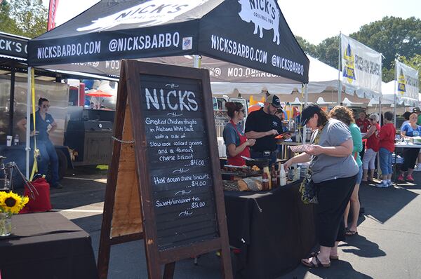 Taste samples from Cobb County area restaurants at recent Taste of Kennesaw event. While jobless claims have fallen, restaurants remain one of the largest contributors to filings for unemployment benefits. But overall, the economic rebound has been strong in metro Atlanta.