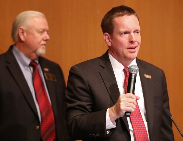 January 6, 2020 Smyrna: Mayor Derek Norton speaks with Charles Welch, Ward 4, looking on during the City Council meeting at Smyrna City Hall on Monday, January 6, 2020, in Smyrna.  Curtis Compton ccompton@ajc.com