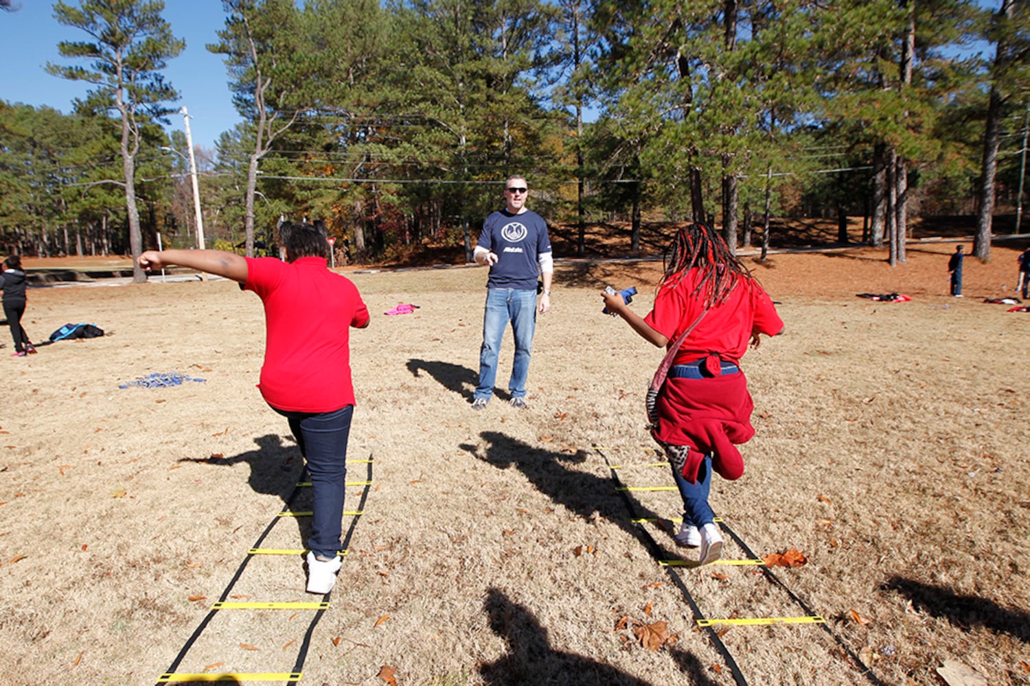 SEC stars build football field in DeKalb