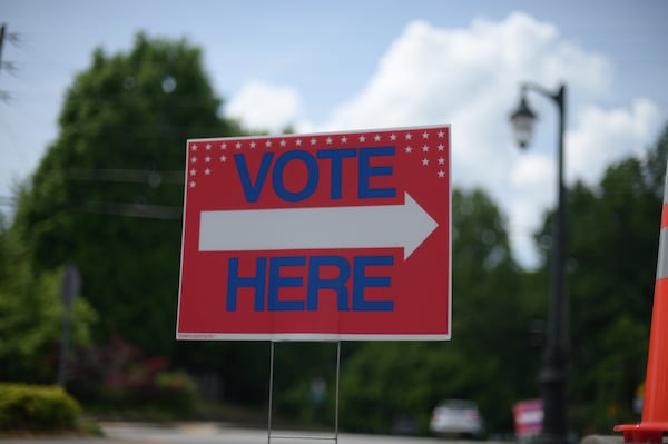 A voting sign outside of Cherokee County Elections Office on May 16, 2022. (Natrice Miller / AJC)