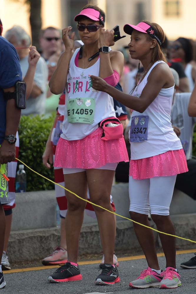 Runners show fashion flair during AJC Peachtree Road Race