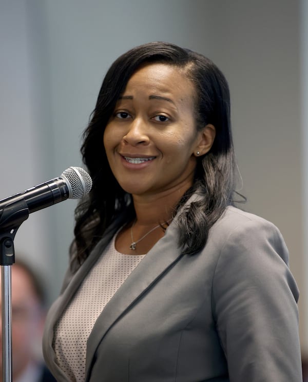 Adrienne Simmons speaks during a candidate forum for the Gwinnett County school board. Simmons appears to be one of two District 4 candidates who will compete in a runoff for the seat. (Jason Getz / Jason.Getz@ajc.com)