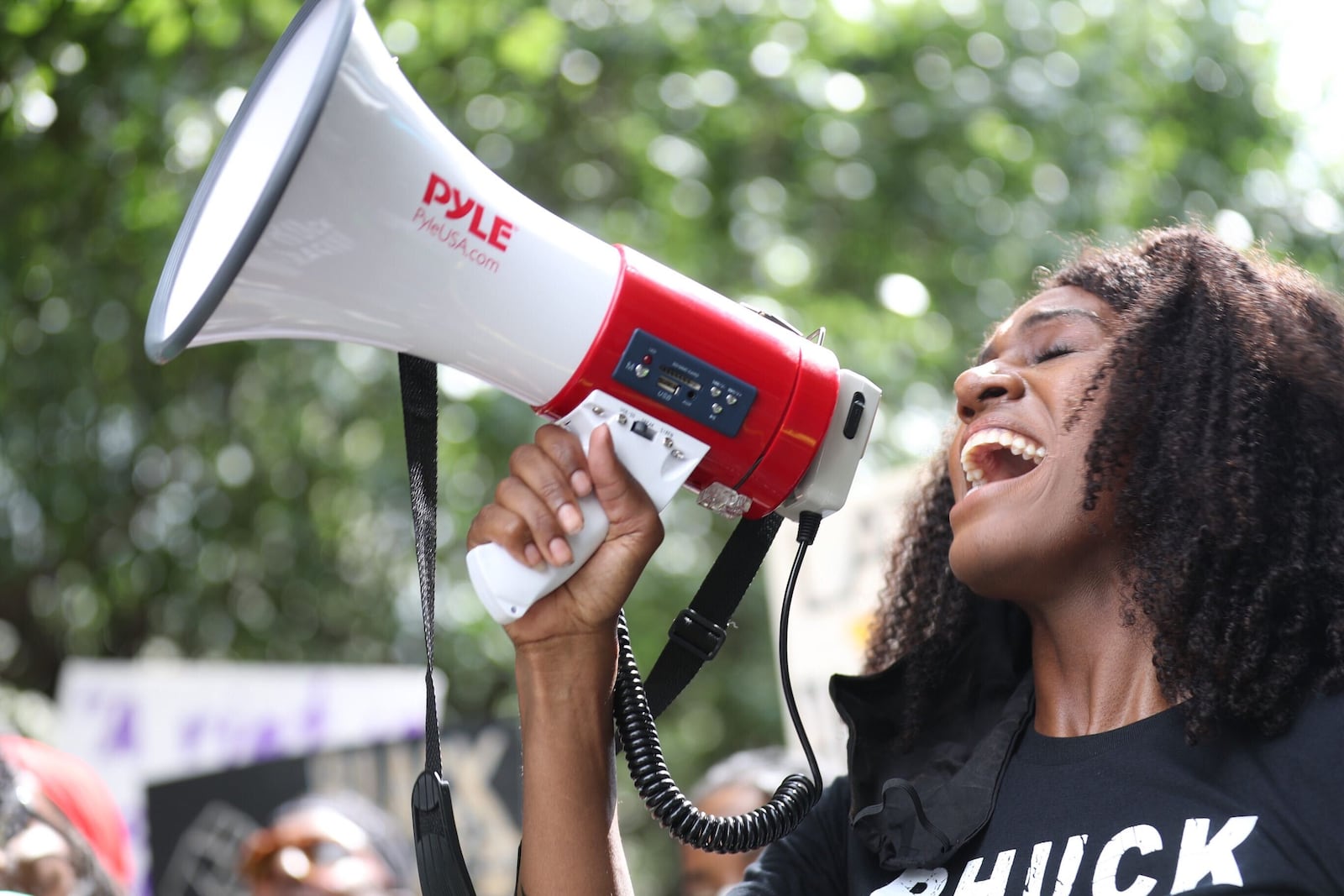 A protester chants "say her name" during a march from Cleopas R. Johnson park to Atlanta City Hall.