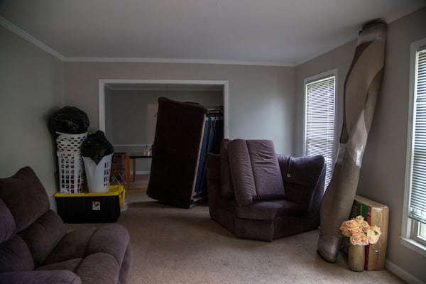 Packed belongings wait to be loaded into a truck in the living room of Joshua Elam’s residence in Decatur earlier this week. With no agreement reached between Elam and his landlord, the CDC’s eviction moratorium has been the only reason why Elam hasn’t been ousted yet. (Alyssa Pointer/Atlanta Journal Constitution)