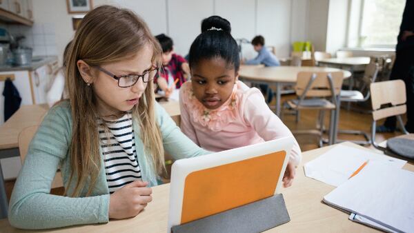 Students in classroom (stock photo).