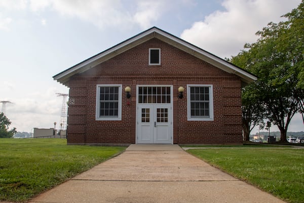 08/03/2021 —Fort Benning, Georgia — The exterior of Wigle Hall at Fort Benning, Tuesday, August 3, 2021. Pvt. Felix Hall, a Black soldier who was lynched at the base in 1941, was said to be headed to this building the day he was killed. It was once a store where African American soldiers could get food, when the base was segregated. (Alyssa Pointer/Atlanta Journal Constitution)