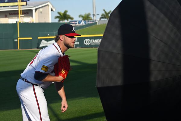 Atlanta Braves relief pitcher A.J. Minter poses for a photograph during the team's photo day at CoolToday Park, Friday, Feb. 23, 2024, in North Port, Florida. (Hyosub Shin / Hyosub.Shin@ajc.com)