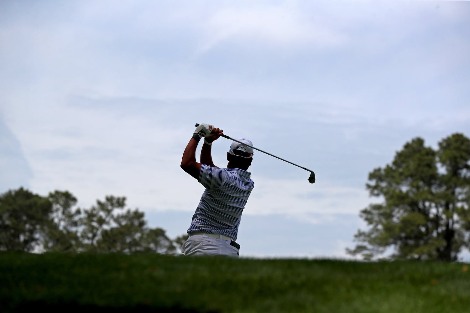 April 8, 2021, Augusta: Hideki Matsuyama tees off on the sixteenth hole during the first round of the Masters at Augusta National Golf Club on Thursday, April 8, 2021, in Augusta. Curtis Compton/ccompton@ajc.com