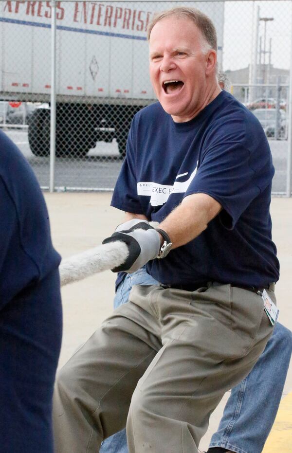 Delta Chief Operating Officer Gil West joined in the action with an all executive team. Friday, teams of Delta Air Lines employees, were competing to see who could drag a Boeing 757 20 feet in the fastest time. The jet drag is part of fundraising activities by Delta to raise money for the American Cancer Society.